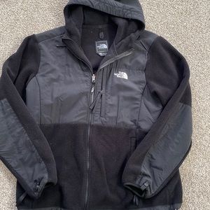The North Face black zip front fleece woman’s jacket. Zip front. Barely worn.